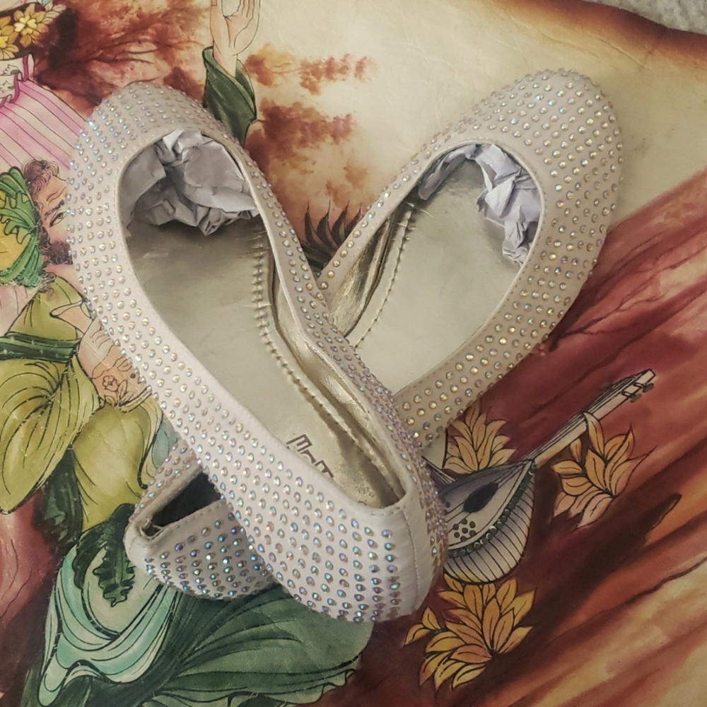 Brash stone-studded flats
